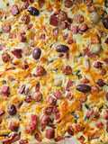Pizza turnata la tava