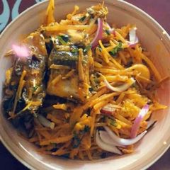 A picture of Abacha with fried fish.