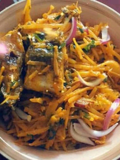 A picture of Abacha with fried fish.