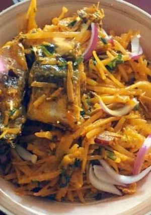 A picture of Abacha with fried fish.