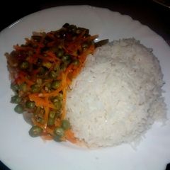 A picture of Rice with peas n grated carrot#authors marathon.