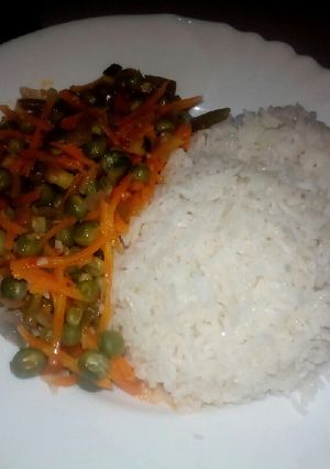 A picture of Rice with peas n grated carrot#authors marathon.