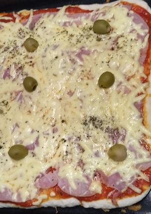 Una foto de Pizza casera esponjosa