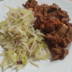 A picture of Fried cabbages with wet fried beef.