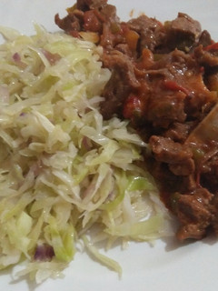 A picture of Fried cabbages with wet fried beef.