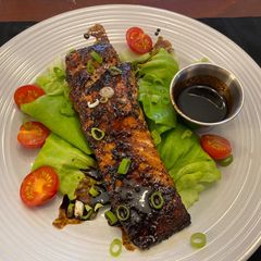 A picture of Salmon with Balsamic Reduction Sauce.