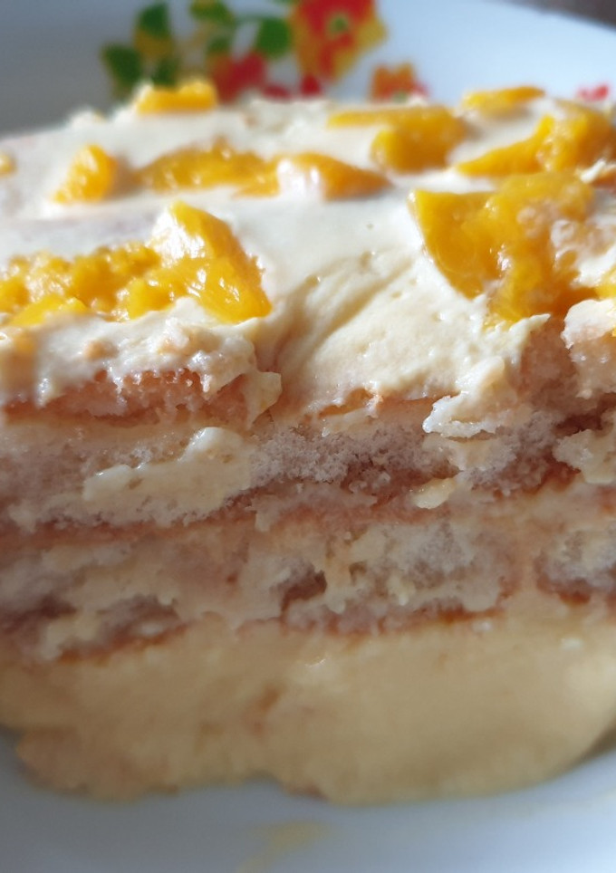 Una foto de Tarta de melocotón con bizcochos de soletilla