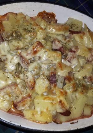 Una foto de Papas españolas al horno