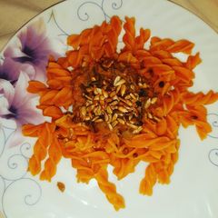 A picture of Red Lentil Fussili with Veggie Sauce and Sunflower Seeds (Vegan).
