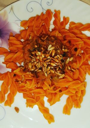 A picture of Red Lentil Fussili with Veggie Sauce and Sunflower Seeds (Vegan).