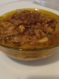 Una foto de Salsa de cebolla al curry con más especias