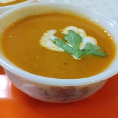A picture of Creamy tomato,carrot soup.