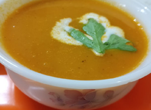 A picture of Creamy tomato,carrot soup.