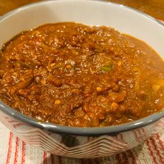 A picture of Onion and Tomato Soup.