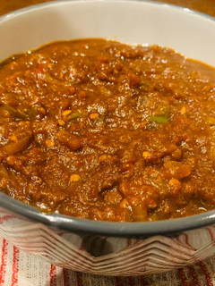A picture of Onion and Tomato Soup.