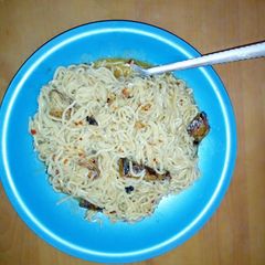 A picture of Noodles with fish.