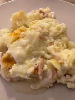 Una foto de Coliflor y repollo con bechamel y bacon