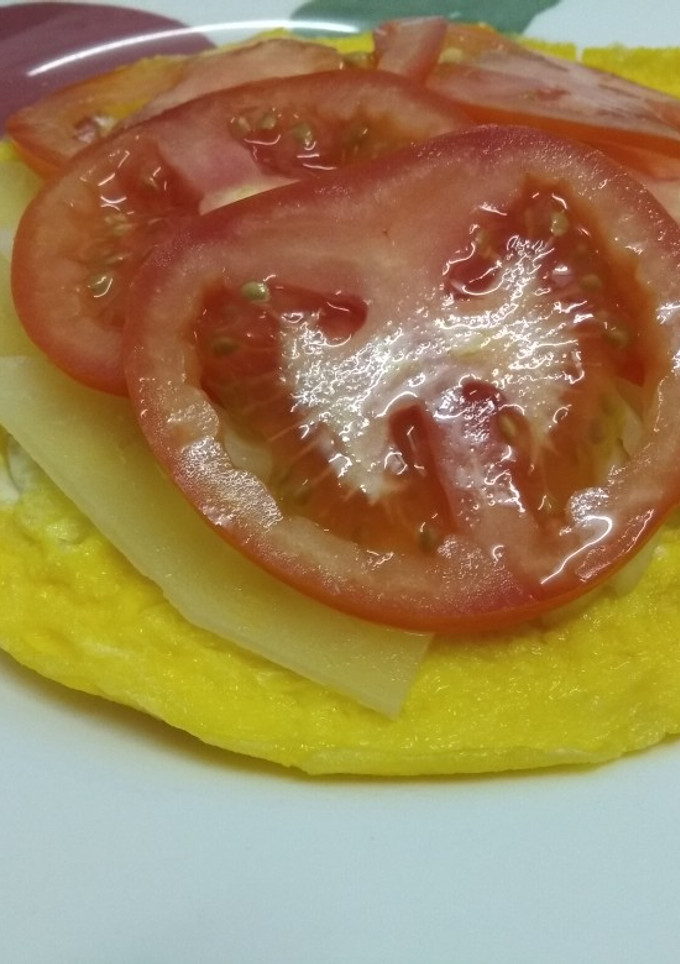 Una foto de Tortilla de bacon con "ensalada"