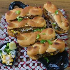 A picture of Cheese,corn & veggies stuffed hot - dog.