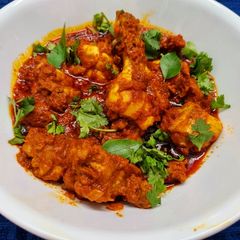 A picture of Chicken Ghee Roast.