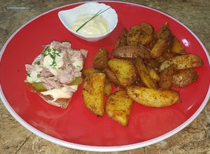 Una foto de Patatas cajun al horno