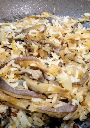 Una foto de Arroz con setas