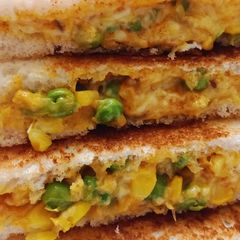 A picture of Cheese corn sandwich.
