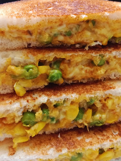 A picture of Cheese corn sandwich.