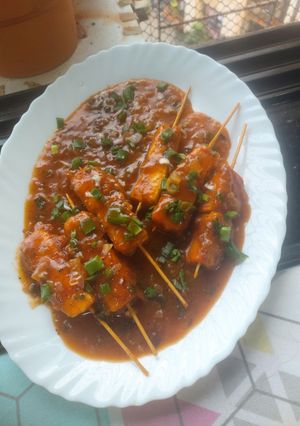 A picture of Paneer satay stick restaurant style.
