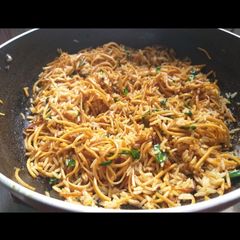A picture of Mixed Hakka noodle fried rice.