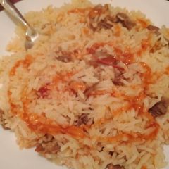 A picture of Rice fried with beef.
