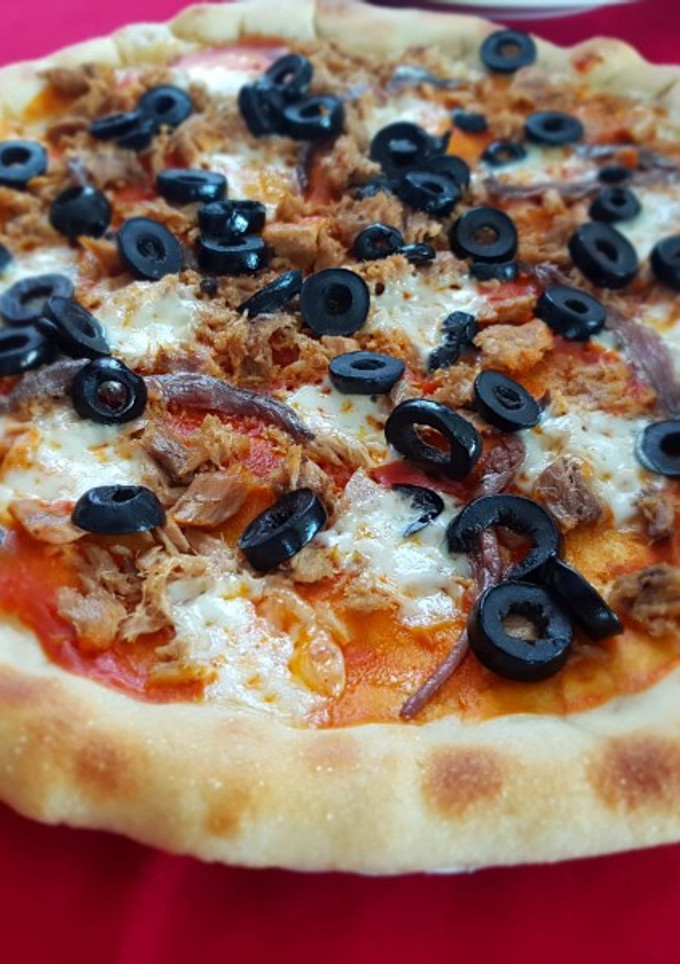 Una foto de Pizza con masa madre