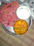 Beetroot paratha with curd and sabji