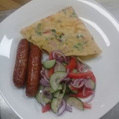 Spanish Omellette, deep fried sausages n cucumber onions salad A picture of Spanish Omellette, deep fried sausages n cucumber onions salad.