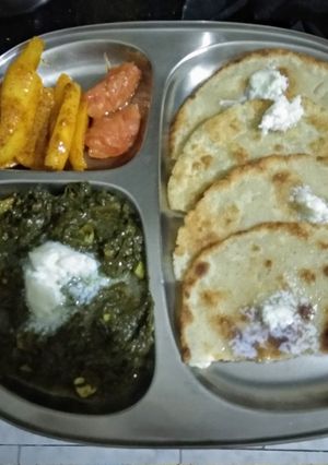 A picture of Makki ki Roti with Sarson ka Saag and chatpata mooli galgal achar.