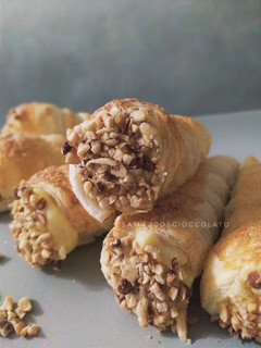 Foto di Cannoncini di pasta sfoglia e crema pasticcera