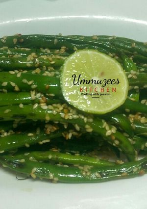 A picture of Beans in toasted sesame and lemon juice.