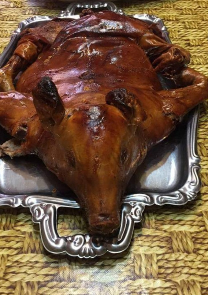 Una foto de Cochinillo asado al horno