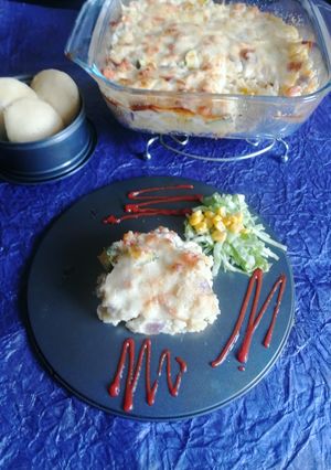 A picture of Baked Idli with White Sauce(leftover idli).