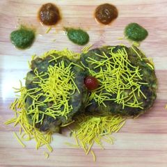 A picture of Spinach knool khol and raw banana veggie kabab.