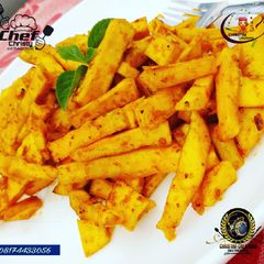 A picture of Peppered potatoe fries.