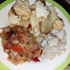 A picture of Fry yam, scrambled egg and cabbage sauce.