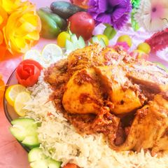 Chicken charga with veggi rice A picture of Chicken charga with veggi rice.