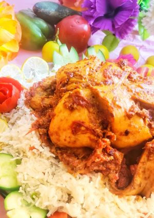 A picture of Chicken charga with veggi rice.