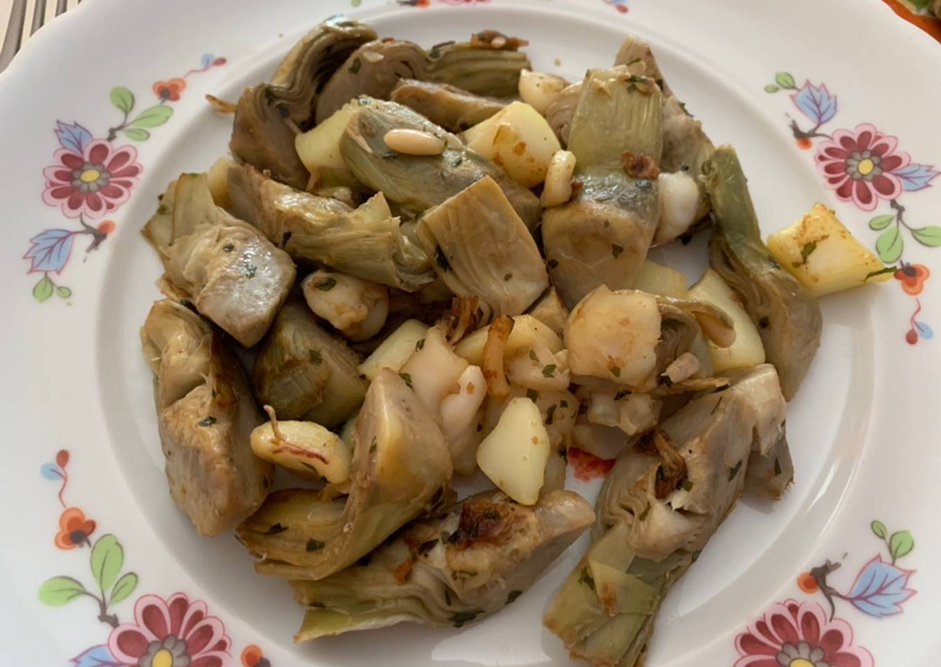 Sepia con alcachofas