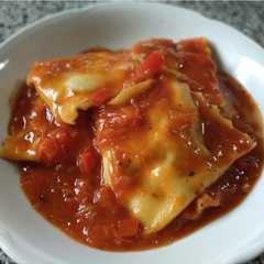 Una foto de Ravioli ricotta espinaca - champiñones