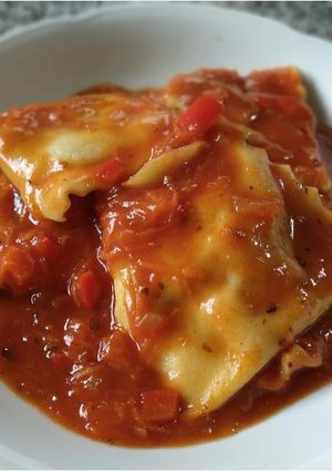 Una foto de Ravioli ricotta espinaca - champiñones
