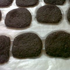 A picture of Chocolate thins with Peanut butter n chocolate filling.