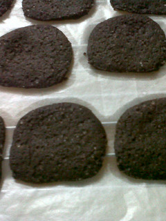 A picture of Chocolate thins with Peanut butter n chocolate filling.