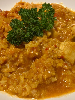 Una foto de Arroz caldoso con pollo